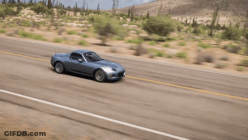 Silver Car Driving On Road With Yellow Line GIF