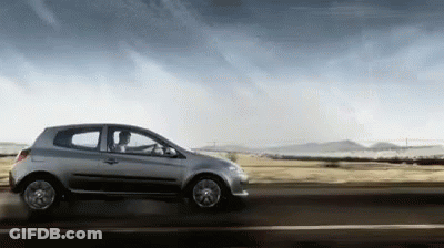 Silver Car Driving Under Cloudy Sky GIF