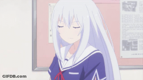 Silver Car Parked In Front Of City With Tokyo Sign GIF