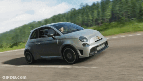 Silver Car With Abarth Driving Down Road GIF