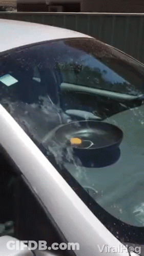 Silver Car With Frying Pan On Windshield GIF