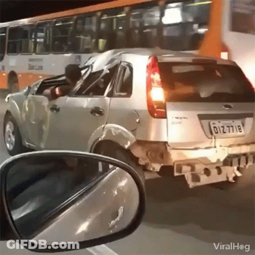 Silver Car With License Plate D12-771E GIF