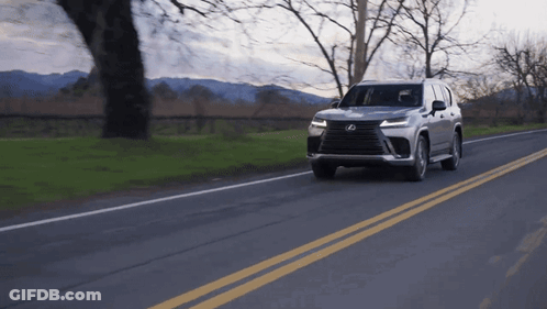 Silver Lexus Driving Down Mountain Road GIF