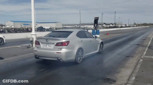 Silver Lexus Driving On Race Track With License Plate 058 Psa GIF