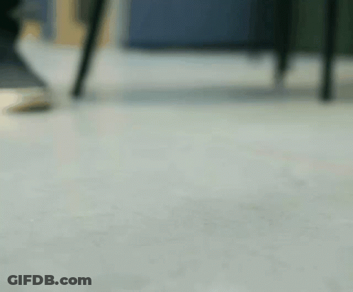 Silver Spoon Flying Through Air GIF