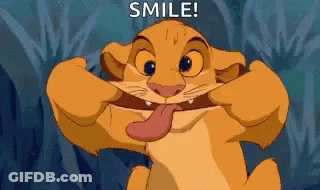 Simba From The Lion King Is Smiling With His Tongue Out . GIF