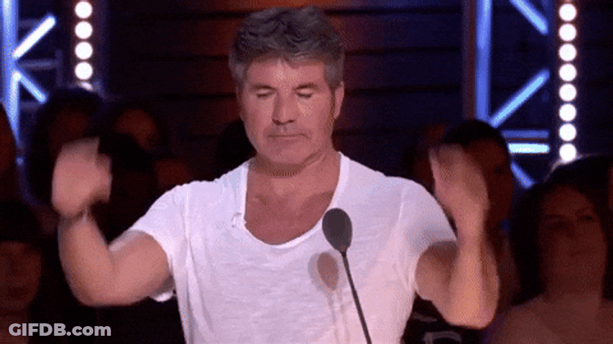Simon Cowell Ear Plugs With His Fingers GIF