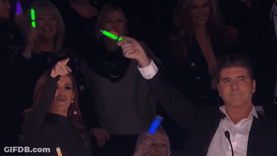 Simon Cowell Rave Glowstick Waving GIF