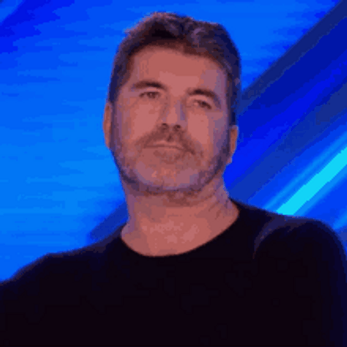 Simon Cowell Resting His Tired Blinking Eyes GIF