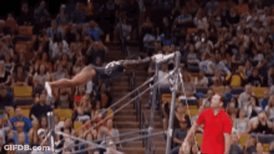 Simone Biles Double Twist Tuck Vault Bar GIF