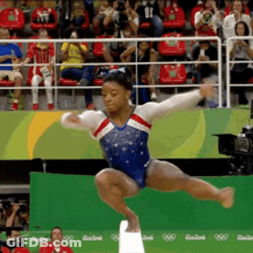 Simone Biles Spin Around Balance Beam Competition GIF