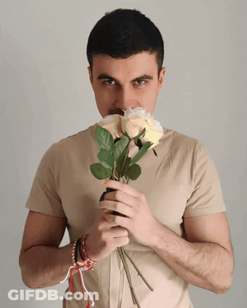 Simple Man Giving Flowers GIF
