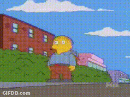 Simpsons Character Standing In Front Of Fox Building GIF