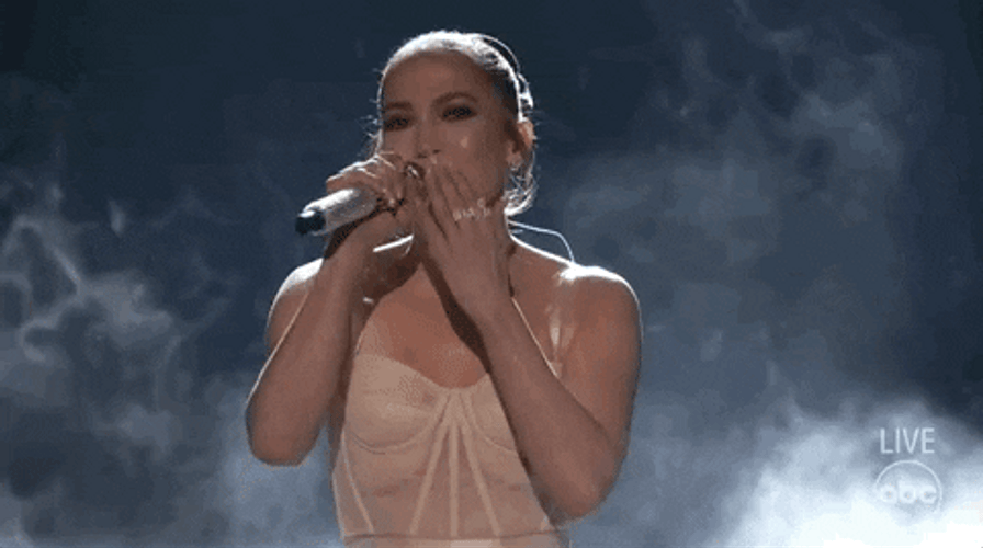 Singer Jennifer Lopez Blow Kiss And Bow GIF