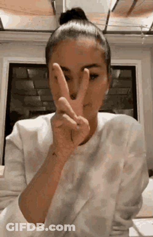 Singer Selena Gomez 2 Finger Sign GIF