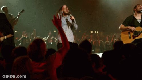 Singer With Microphone And Guitarist GIF