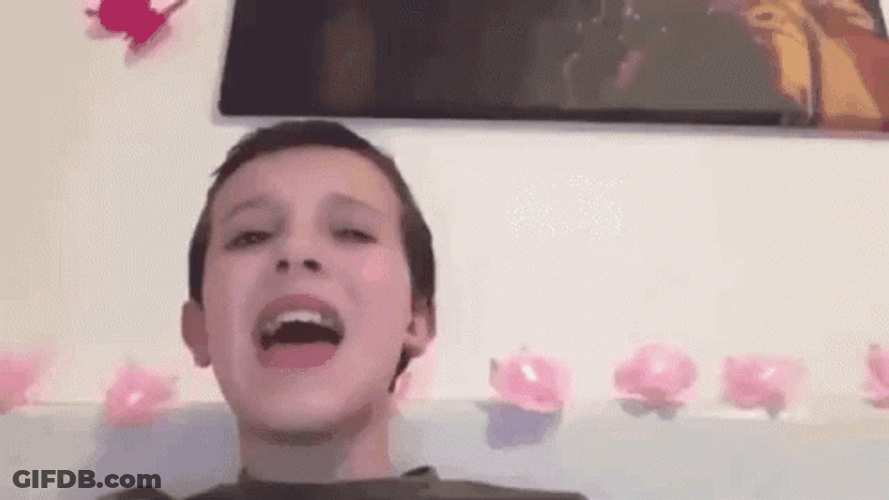 Singing Millie Bobby Brown Flower Background GIF