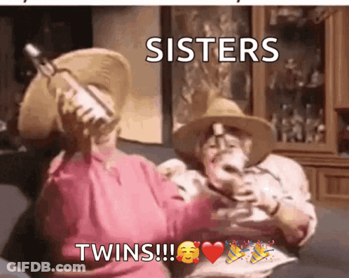 Sisters Twins Sitting On Couch GIF