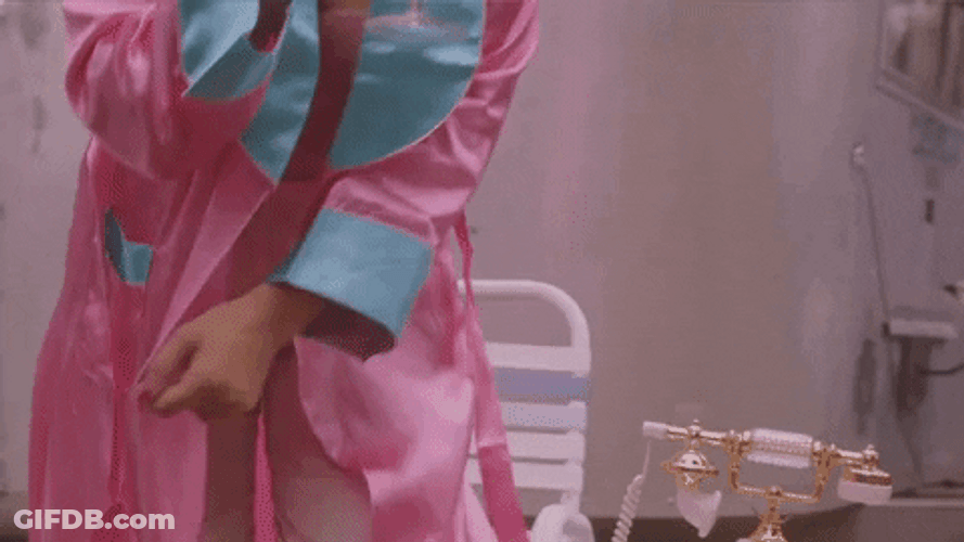 Sit Down Woman Holding Wine Glass GIF