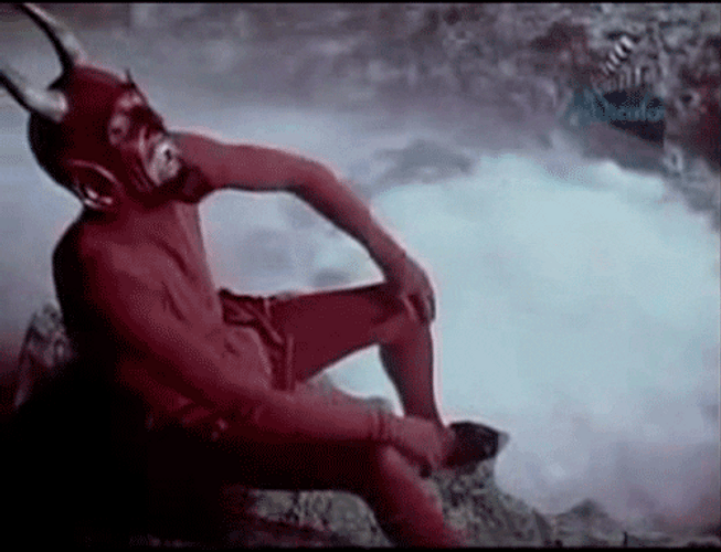 Sitting Devil Looking Up GIF