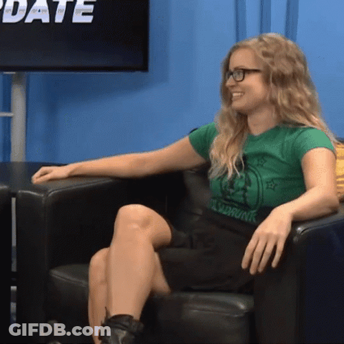 Sitting Girl Playing Smallest Violin GIF