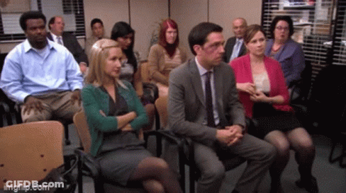 Sitting Group With Man In Suit And Tie GIF