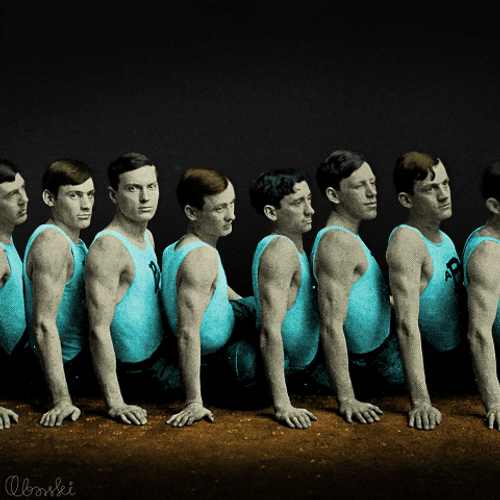 Sitting Men Bumping Heads Domino Chain Reaction GIF