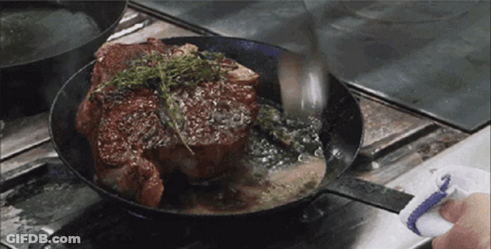 Sizzling Meat Perfection In Pan GIF