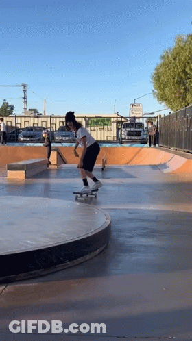 Skateboarder Doing Trick On Ramp GIF