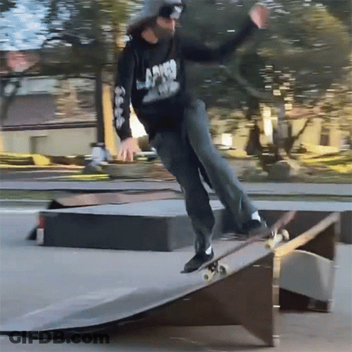 Skateboarder In Black Ambush Sweatshirt GIF