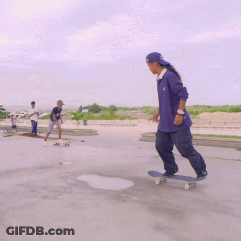 Skateboarder In Purple Adidas Shirt GIF