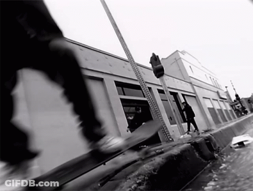 Skateboarding Person In Front Of Building GIF