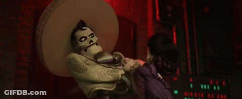 Skeleton In Sombrero Dancing With Woman In Purple GIF