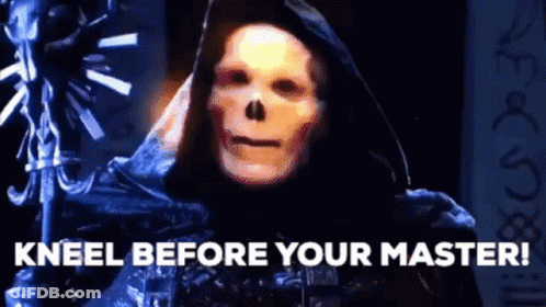 Skeleton Kneeling Before Sign Saying Kneel Before Your Master GIF
