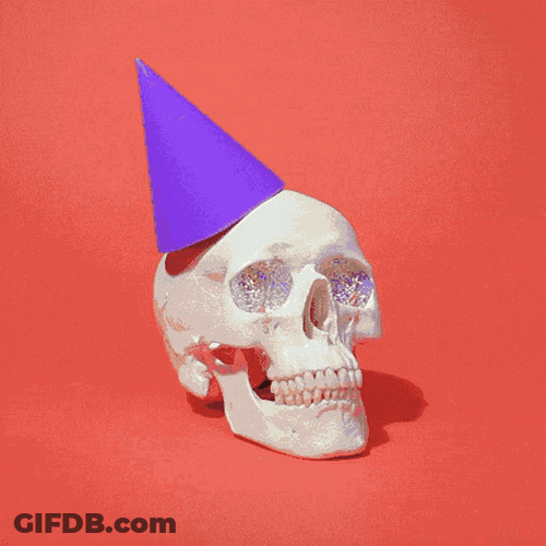 Skeleton Party Skull With Candles GIF