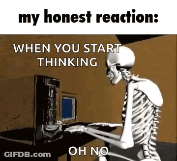 Skeleton Sitting At Desk With Computer Keyboard GIF