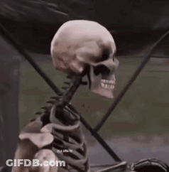 Skeleton Sitting In Front Of Black Tent GIF