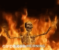 Skeleton Standing By Fire Saying Good Morning GIF