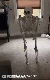 Skeleton Standing By Window In Living Room GIF
