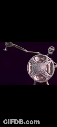 Skeleton Statue Holding Shield And Sword GIF