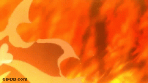 Skeleton Surrounded By Flames In Dark Room GIF