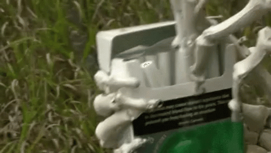 Skeleton Waiting And Smoking GIF