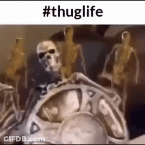 Skeletons Standing Around Man Statue GIF