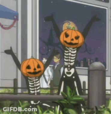 Skeletons With Pumpkin Heads Standing In Front Of Building GIF
