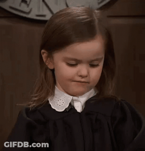 Skeptical Little Girl Smirking GIF