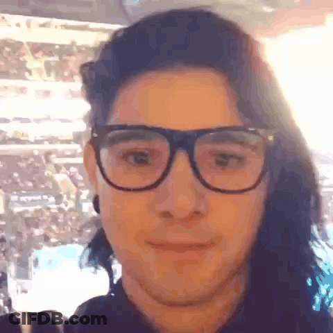 Skrillex Logo On Blue Background GIF
