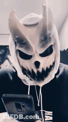 Skull Mask Person On Couch Phone GIF