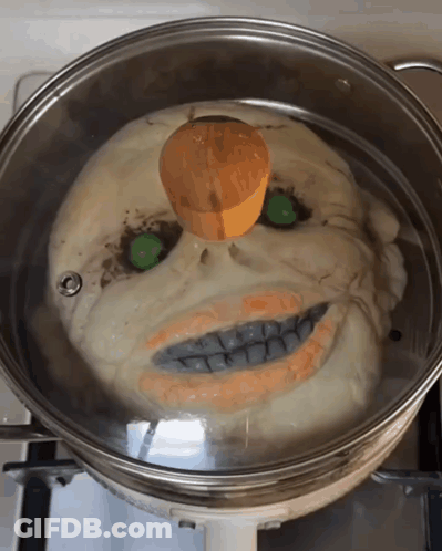 Skull-Shaped Food Pot With Wooden Lid GIF