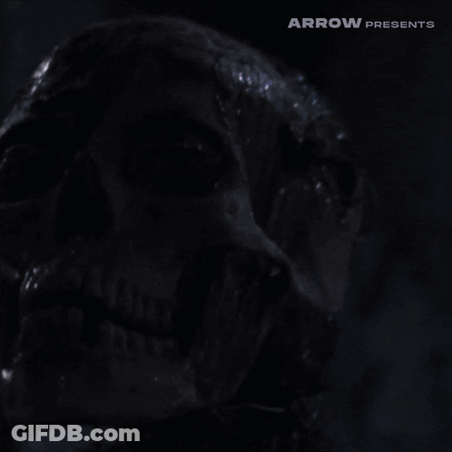 Skull With Arrow Presents Close Up GIF