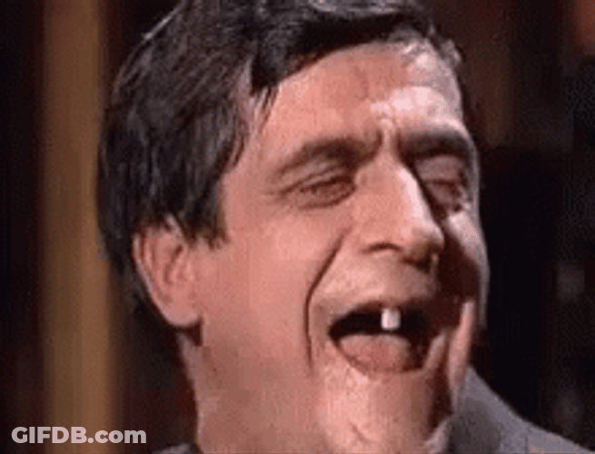 Slacker Guy One Tooth Laughs GIF